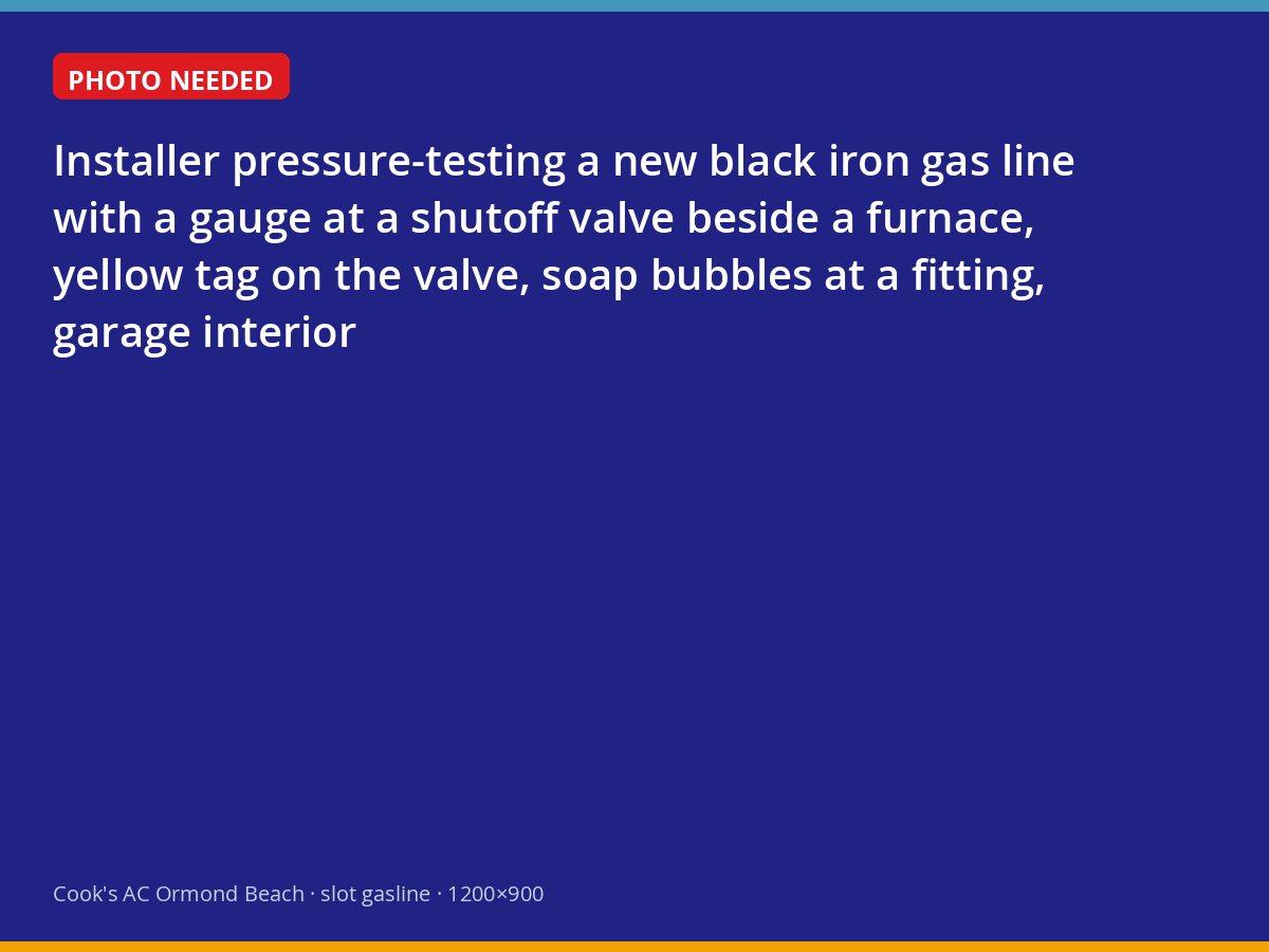 Technician pressure-testing a new gas line connection at a furnace