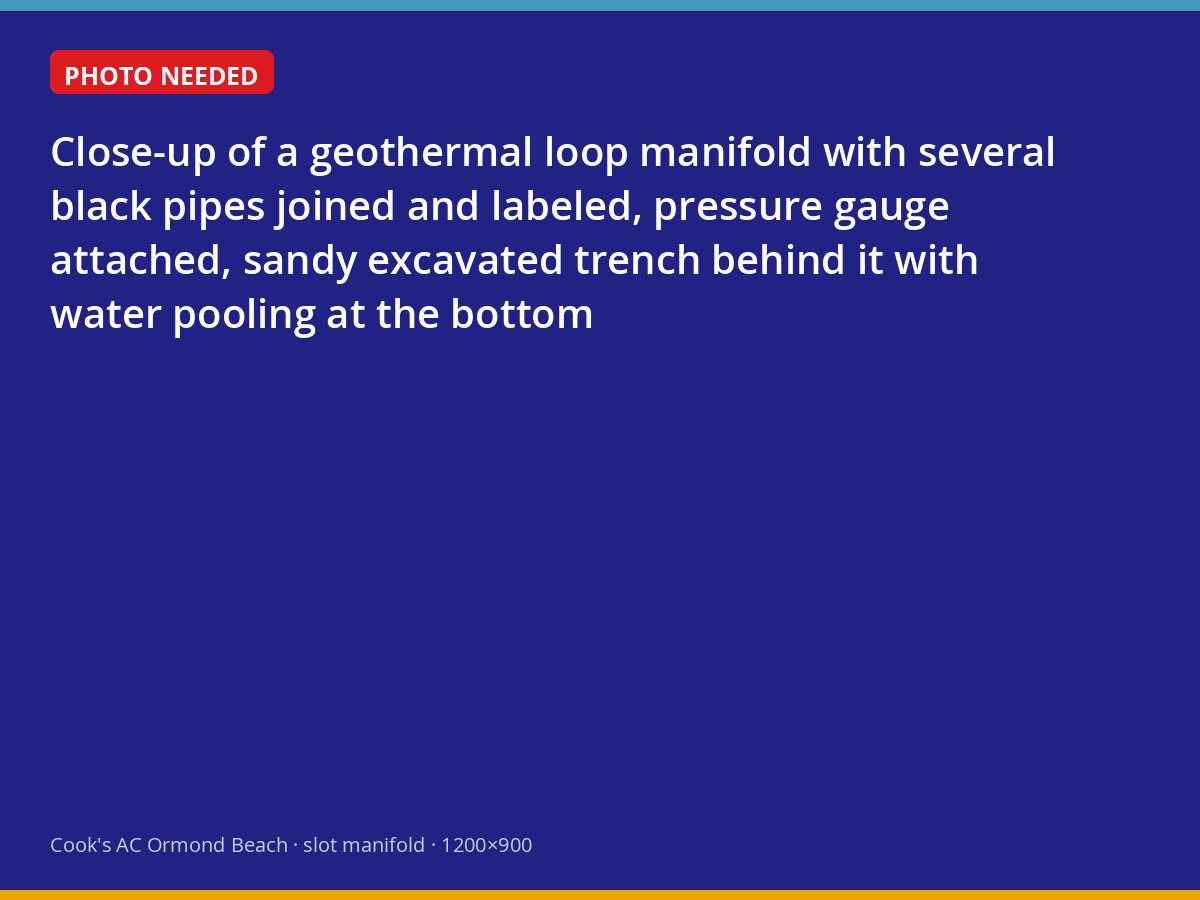 Geothermal loop manifold with pressure gauge beside a sandy trench holding groundwater
